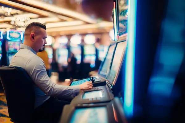 A young woman relaxing with her phone while dynamic casino elements float around her, illustrating the smooth mobile experience offered by the CU888 app.