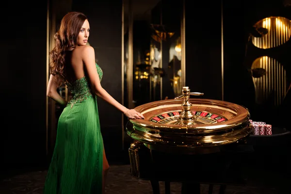 A person using their device against a moody casino-themed background, illustrating the smooth re-entry process at CU888.